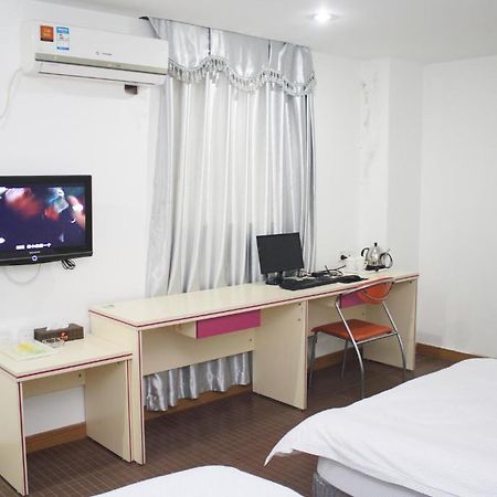 Guangyue Hotel Cantón Habitación foto