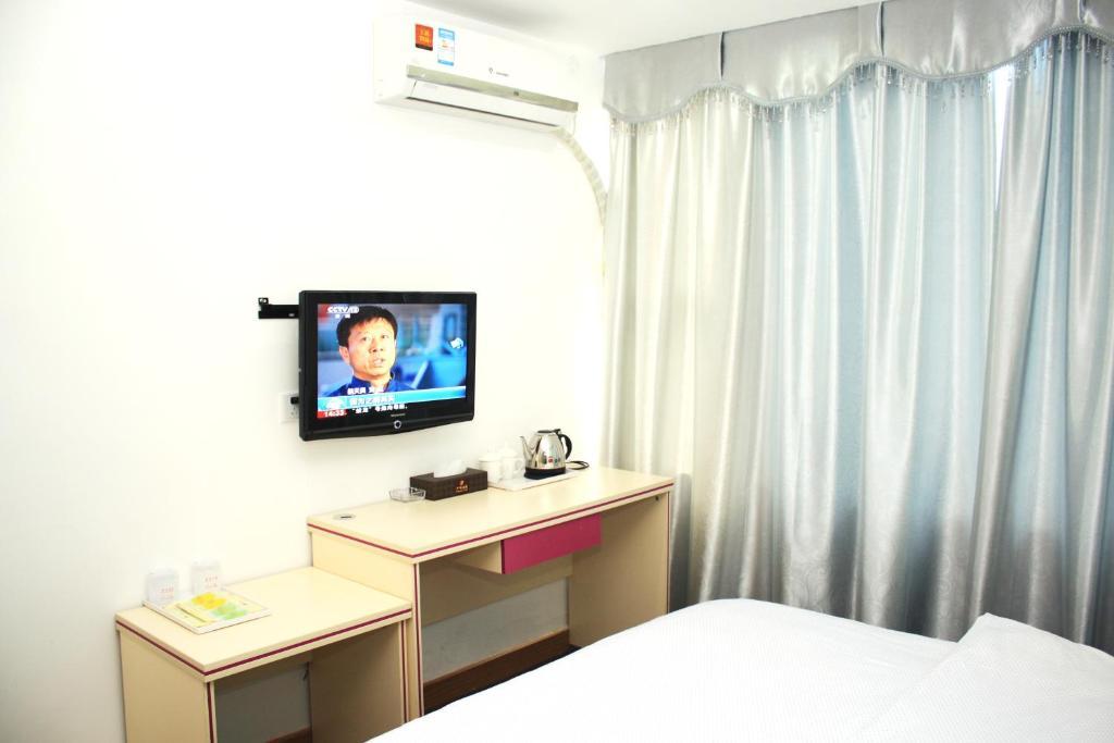 Guangyue Hotel Cantón Habitación foto