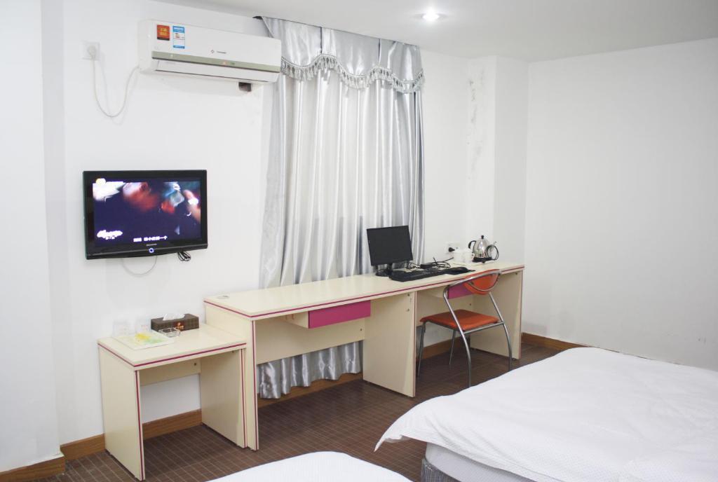 Guangyue Hotel Cantón Habitación foto